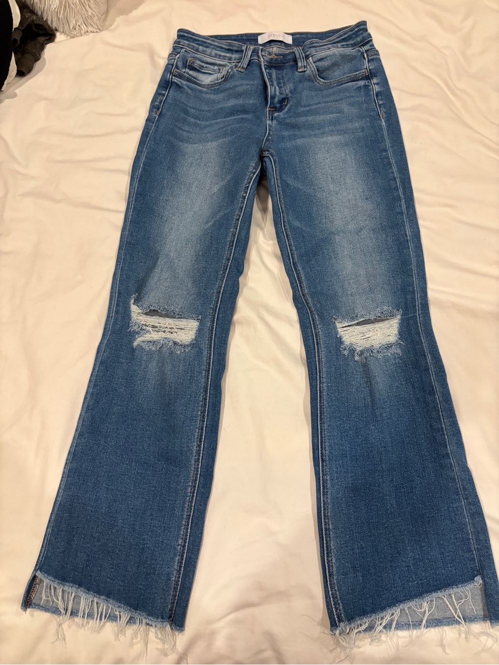 Mid-Rise Distressed Flare Jeans in Mid Blue